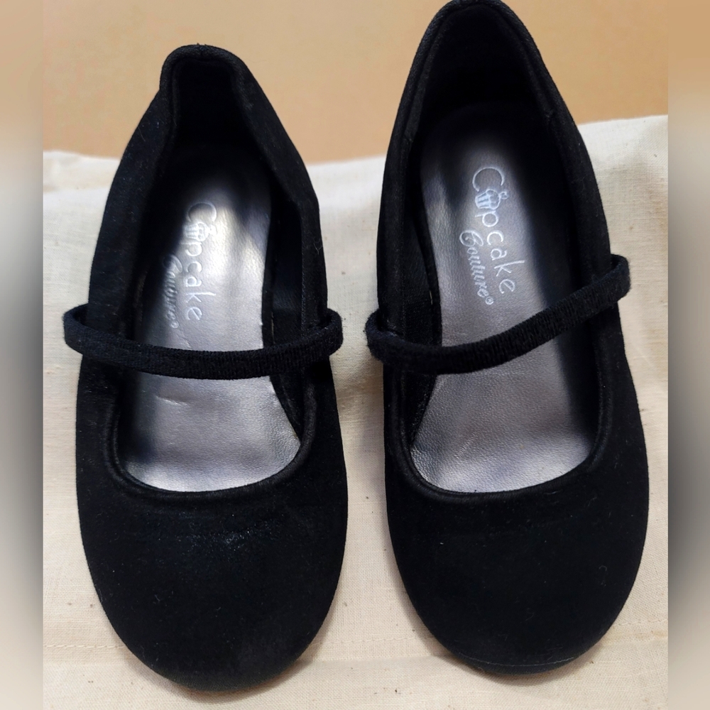 Used Cupcake Couture black suede girl's shoes.